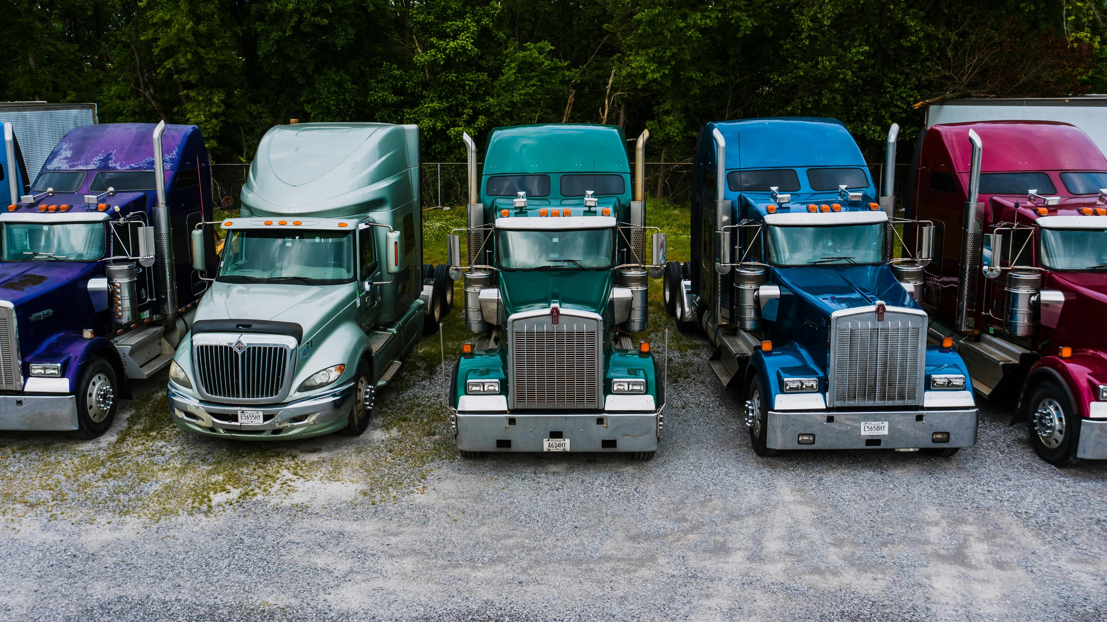 Fleet of trucks at logistics facility